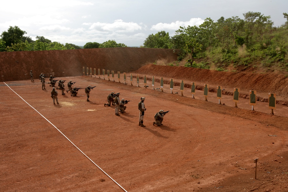 Benin, U.S. service members trade, fire weapons