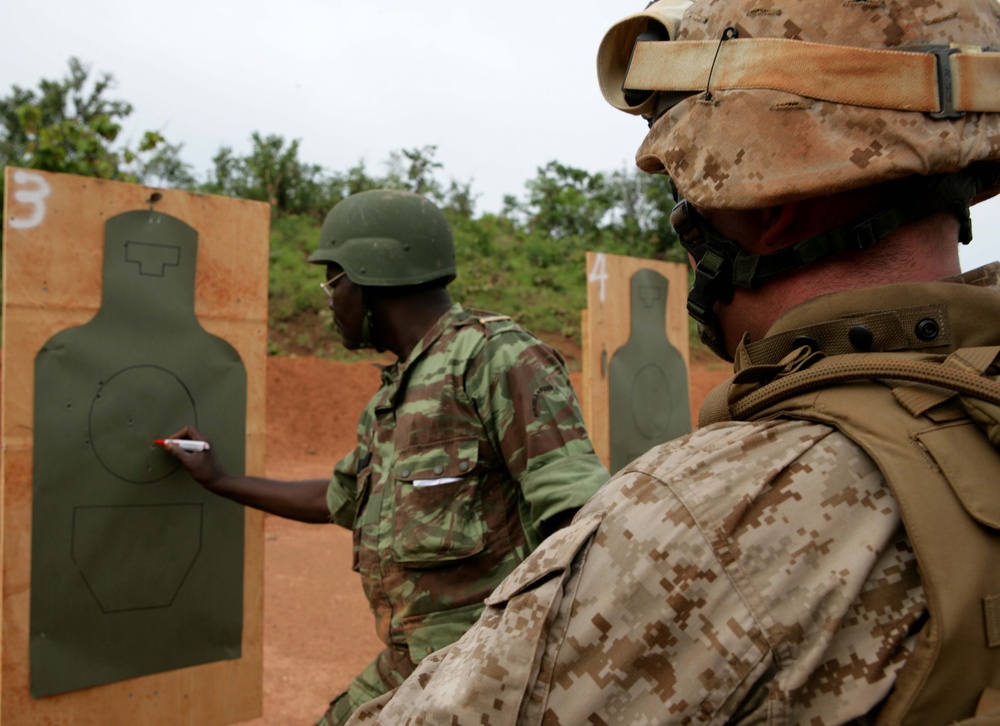 Benin, U.S. service members trade, fire weapons