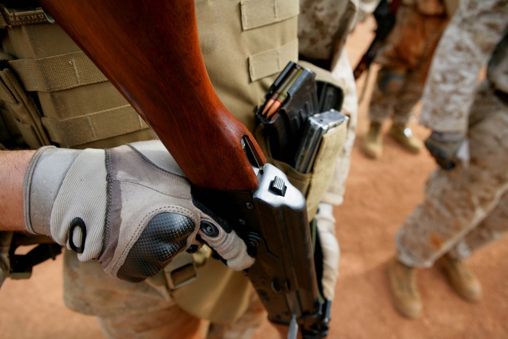 Benin, U.S. service members trade, fire weapons