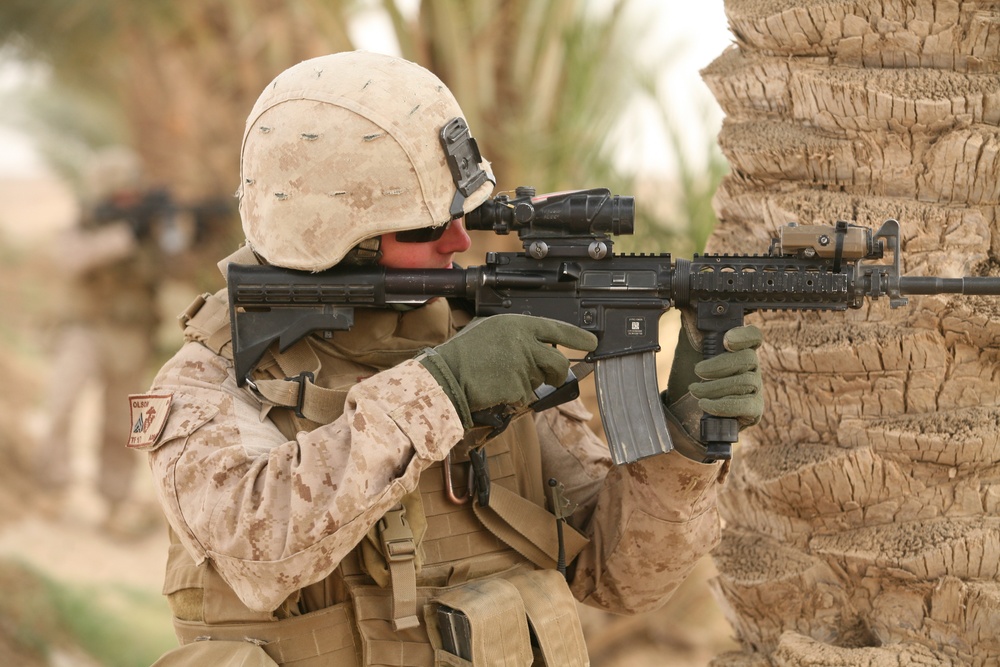 Marines conduct security patrol around Combat Outpost Viking, Iraq