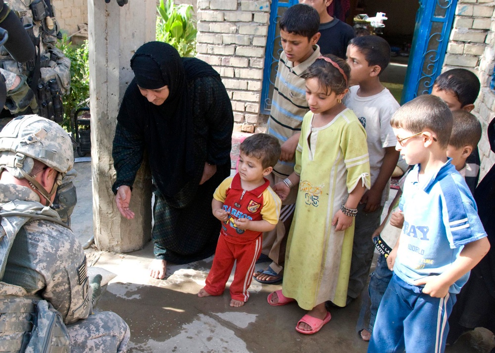 Pennsylvania National Guard Soldiers deliver food to Abu Ghraib orphanage