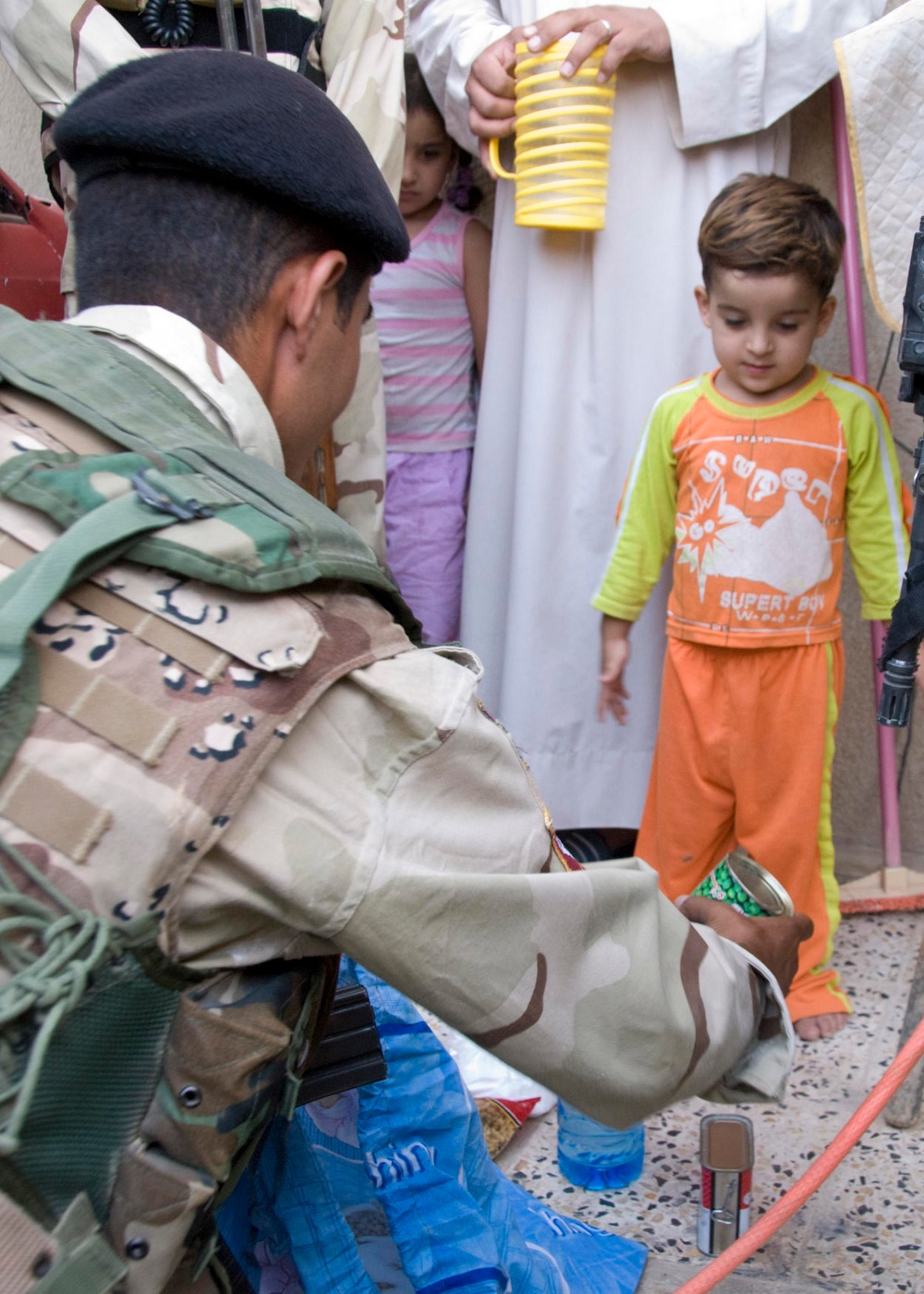 Pennsylvania National Guard Soldiers deliver food to Abu Ghraib orphanage