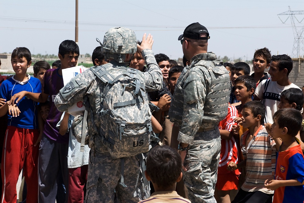 Soldiers Patrol Basra Streets