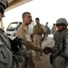 U.S. Soldiers Assist Iraqis at Checkpoints