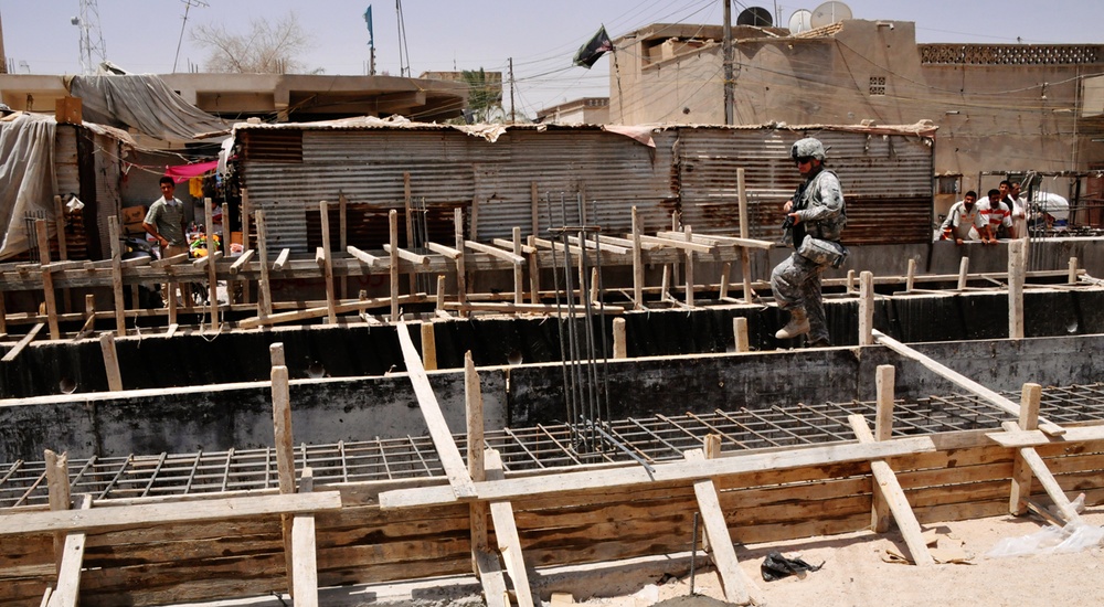 Warhorse Soldiers visit fish market, assess construction progress