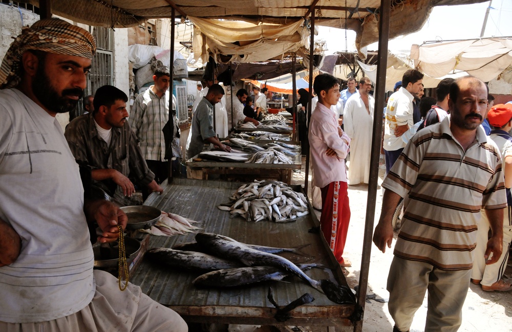 Warhorse Soldiers visit fish market, assess construction progress