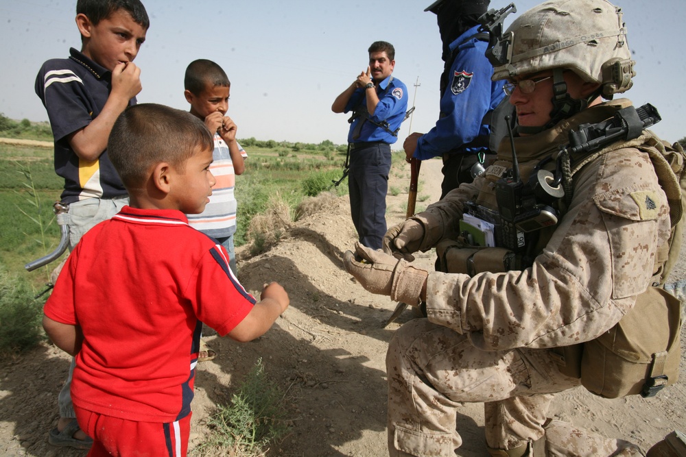 Marines Search for Weapons Cache