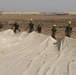 Marines prepare fuel bladder at Camp Ramadi