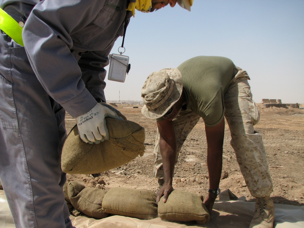 Marines prepare fuel bladder at Camp Ramadi
