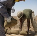 Marines prepare fuel bladder at Camp Ramadi
