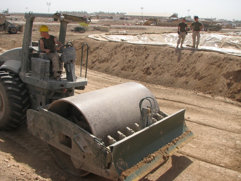 Marines prepare fuel bladder at Camp Ramadi