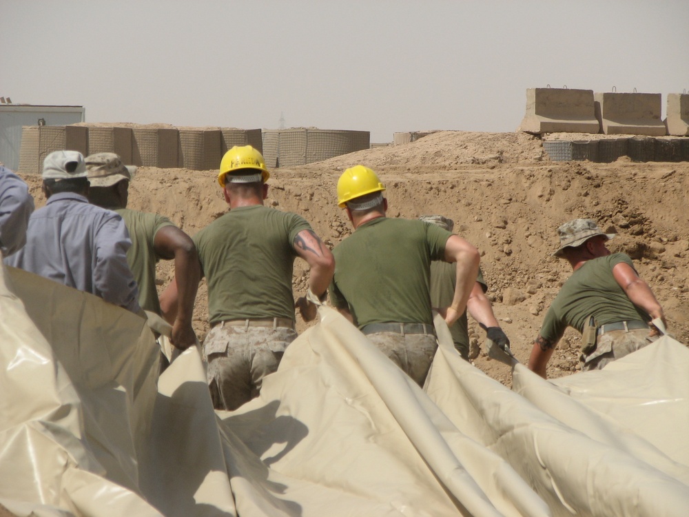 Marines prepare fuel bladder at Camp Ramadi