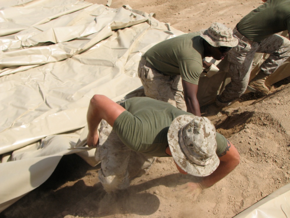 Marines prepare fuel bladder at Camp Ramadi