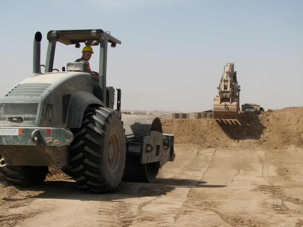 Marines prepare fuel bladder at Camp Ramadi