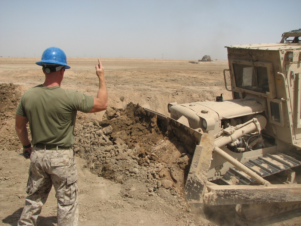 Marines prepare fuel bladder at Camp Ramadi