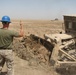 Marines prepare fuel bladder at Camp Ramadi