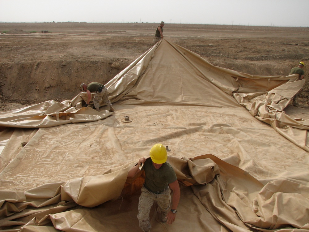 Marines prepare fuel bladder at Camp Ramadi