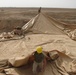 Marines prepare fuel bladder at Camp Ramadi