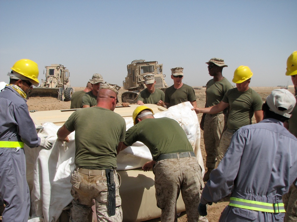 Marines prepare fuel bladder at Camp Ramadi