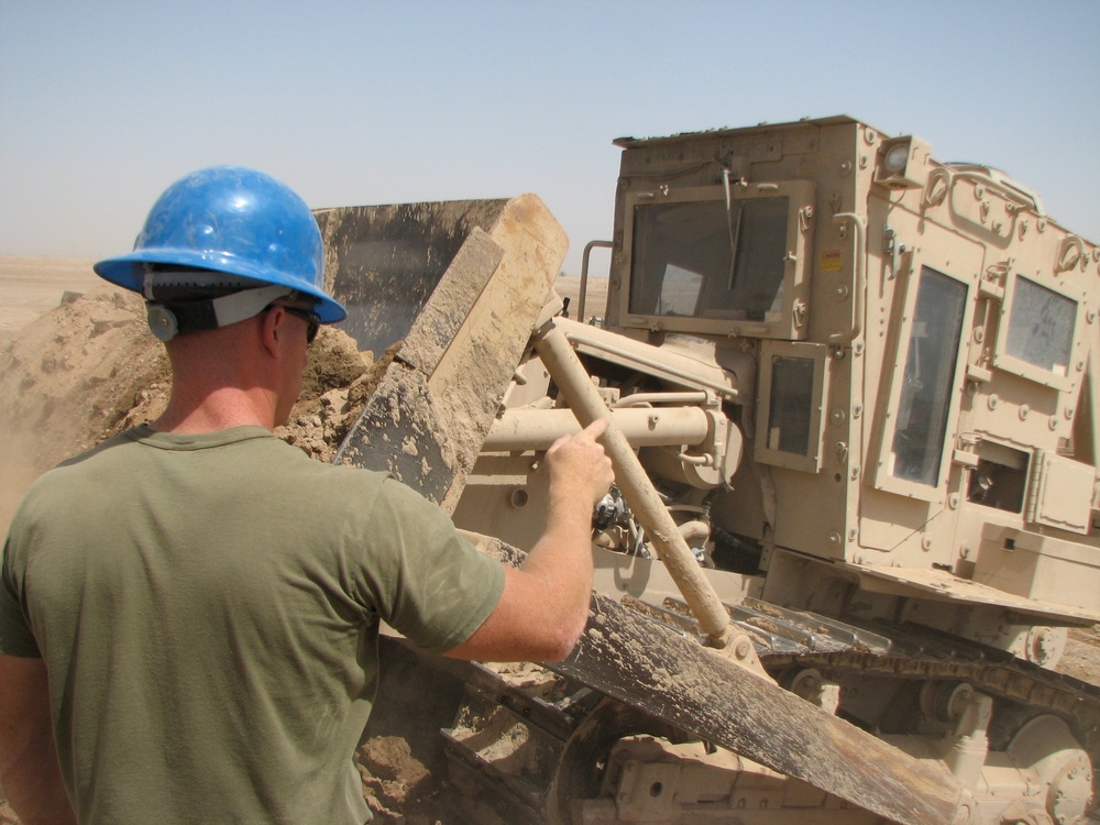 Marines prepare fuel bladder at Camp Ramadi