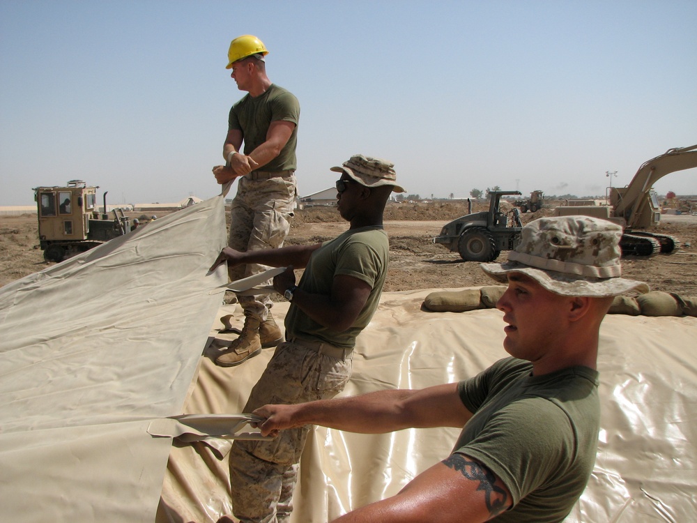 Marines prepare fuel bladder at Camp Ramadi
