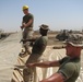 Marines prepare fuel bladder at Camp Ramadi