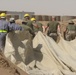 Marines prepare fuel bladder at Camp Ramadi