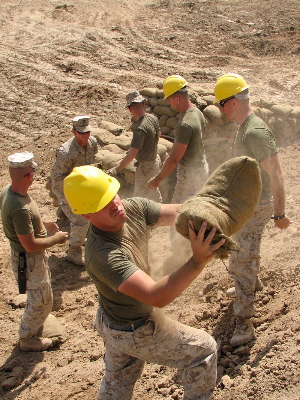Marines prepare fuel bladder at Camp Ramadi
