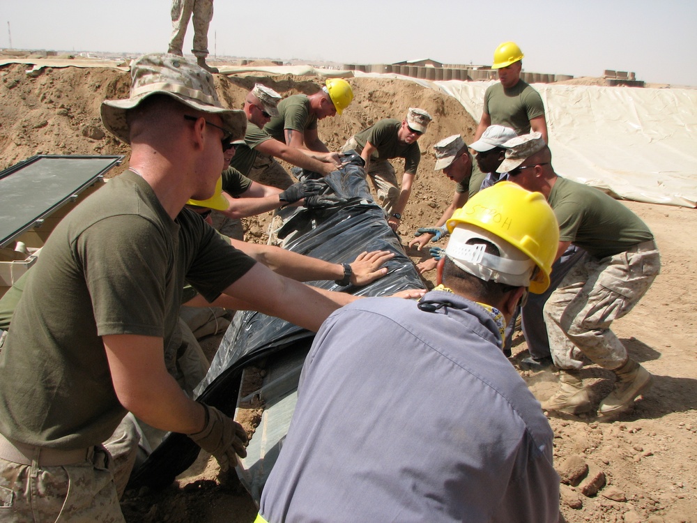 Marines prepare fuel bladder at Camp Ramadi