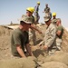 Marines prepare fuel bladder at Camp Ramadi