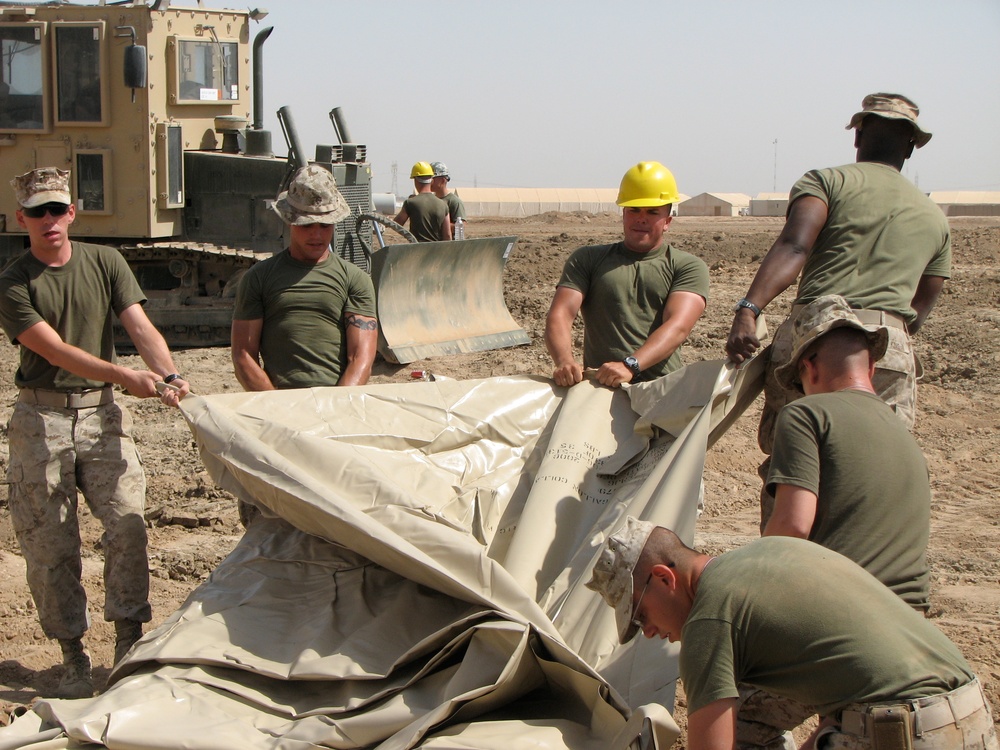 Marines prepare fuel bladder at Camp Ramadi