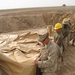 Marines prepare fuel bladder at Camp Ramadi