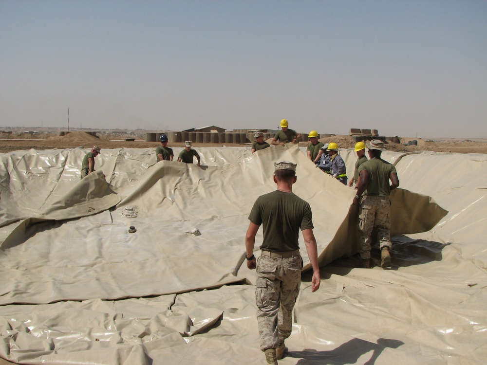 Marines prepare fuel bladder at Camp Ramadi