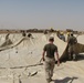 Marines prepare fuel bladder at Camp Ramadi