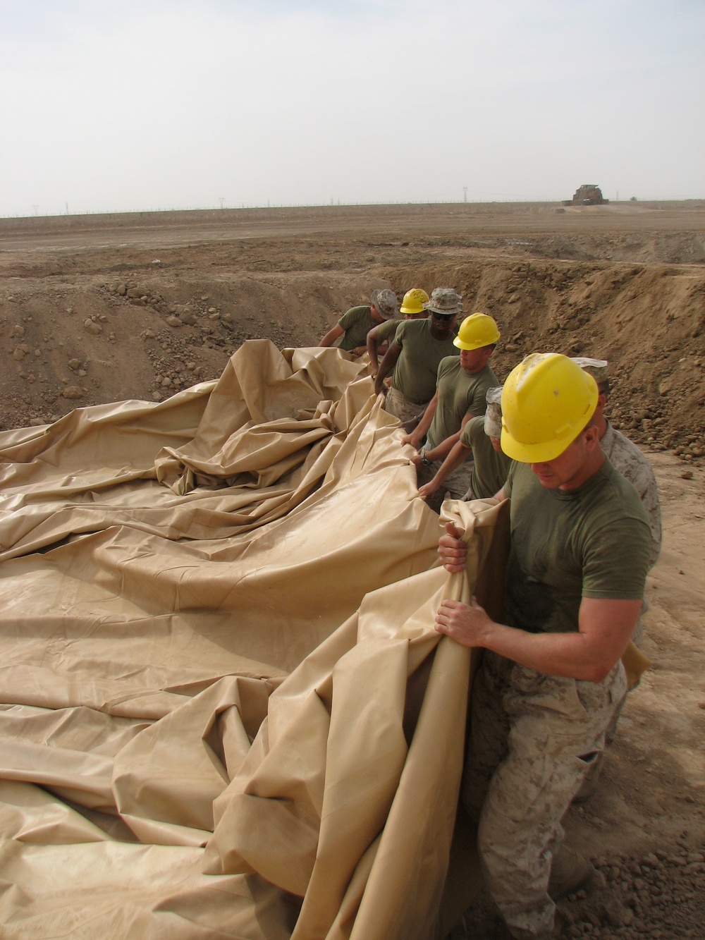 Marines prepare fuel bladder at Camp Ramadi