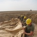 Marines prepare fuel bladder at Camp Ramadi