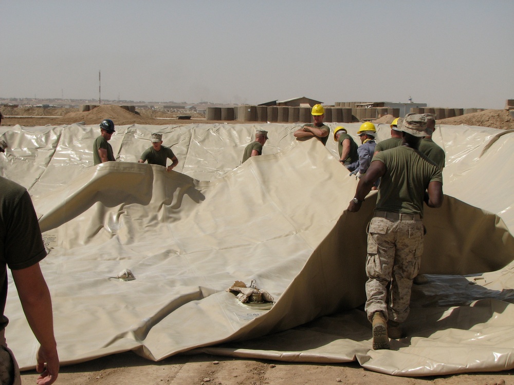 Marines prepare fuel bladder at Camp Ramadi