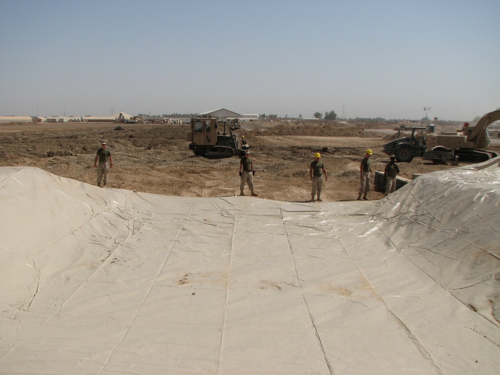 Marines prepare fuel bladder at Camp Ramadi