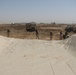 Marines prepare fuel bladder at Camp Ramadi