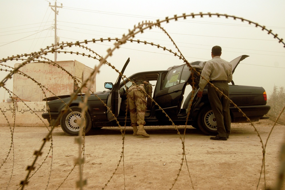 U.S. Soldiers Support Iraqis During Checkpoint Operations