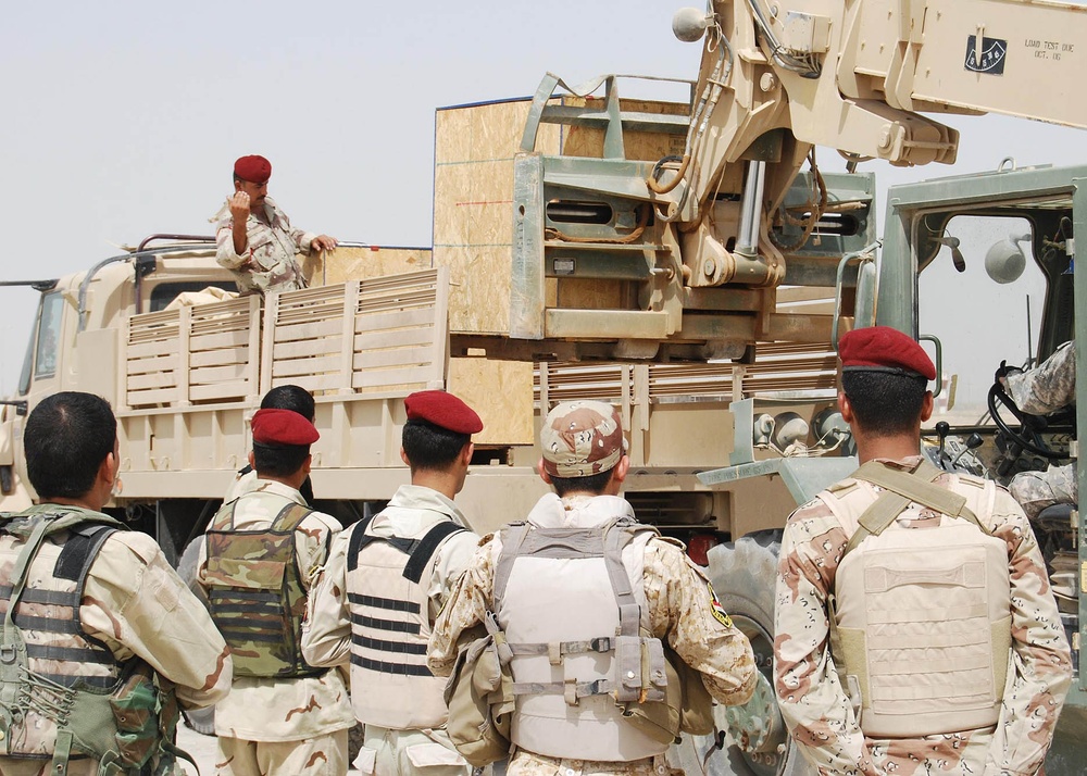 Iraqi Air Force, Army Deliver Supplies to Local Communities
