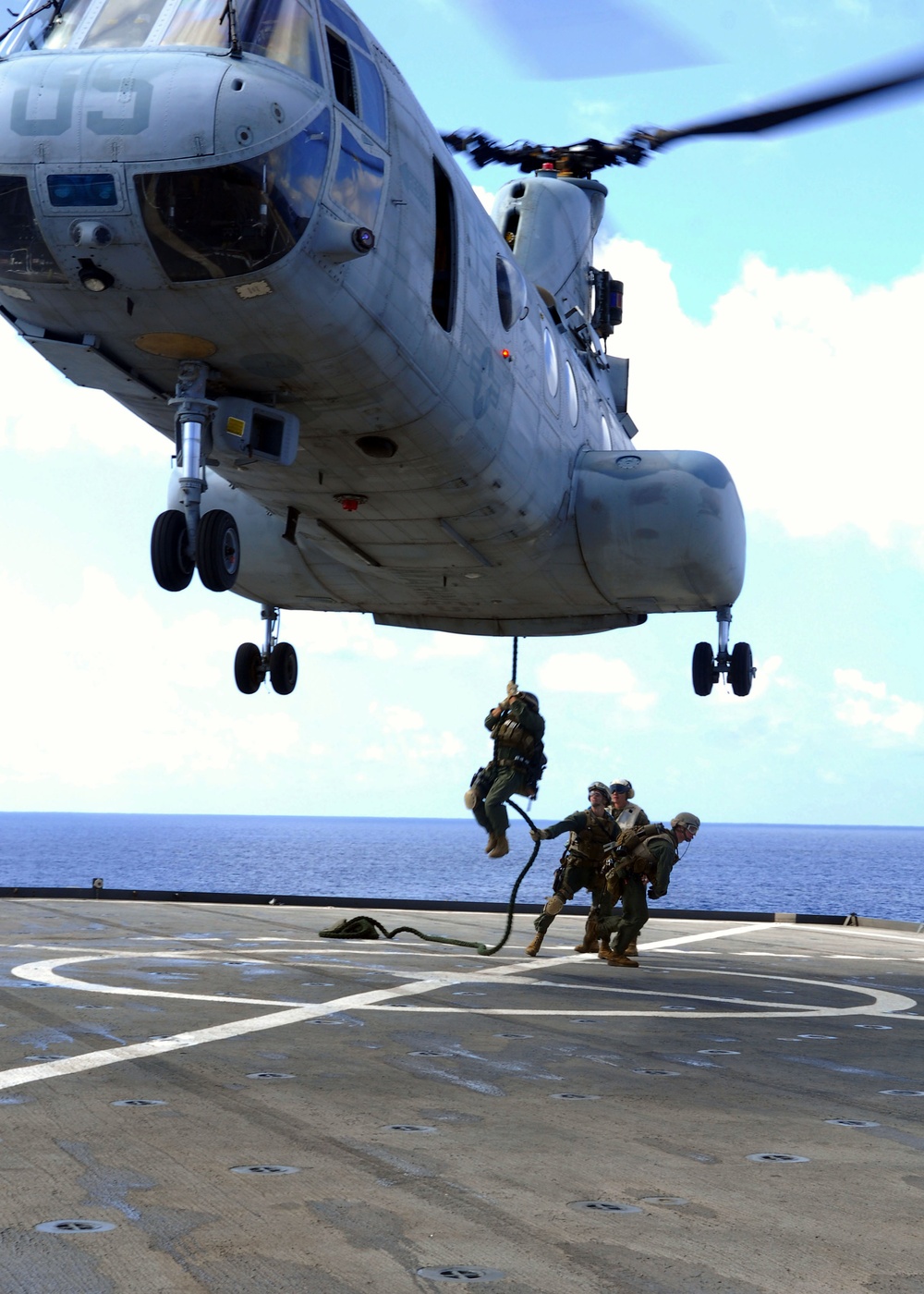 Marines fastrope onto USS Tortuga