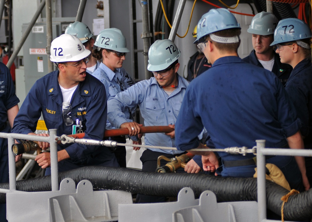 Sailor Instructs Firefighting Techniques