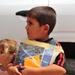 Soldiers Hand Out School Supplies