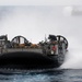 Landing craft steam from USS Bonhomme Richard