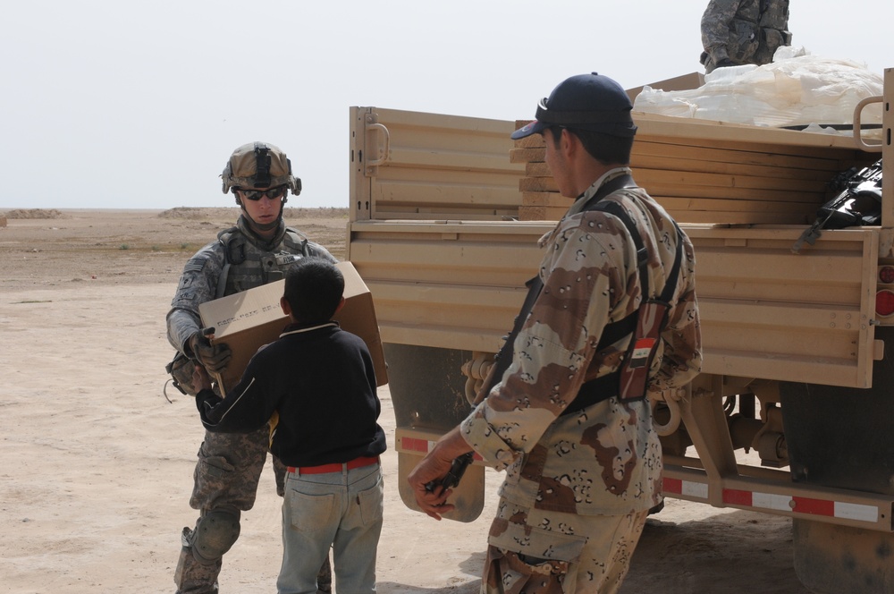 Soldiers Distribute Water and Food