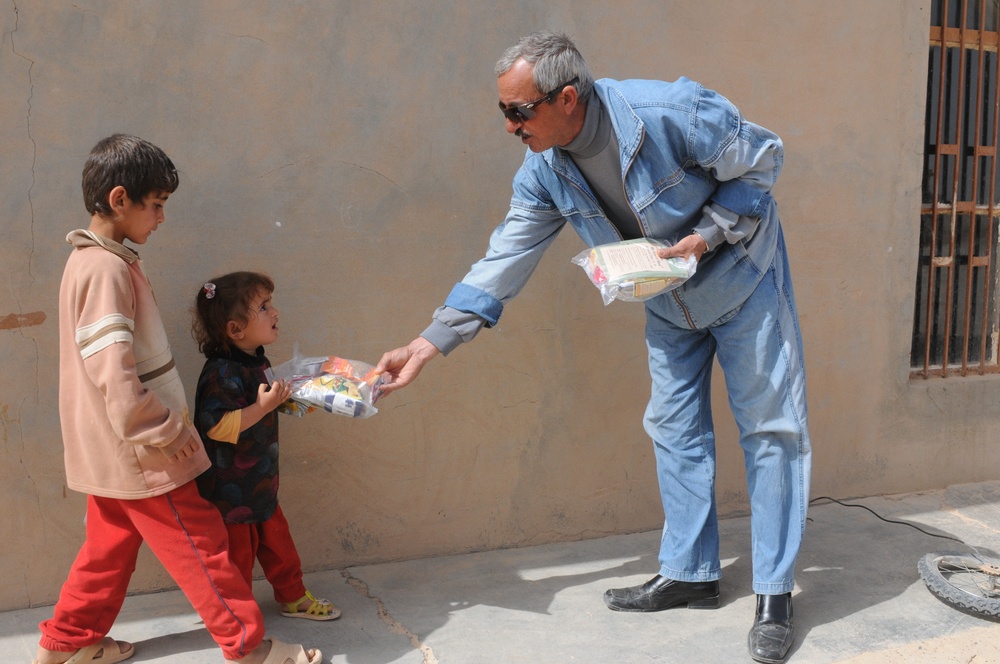 Soldiers Distribute Water and Food