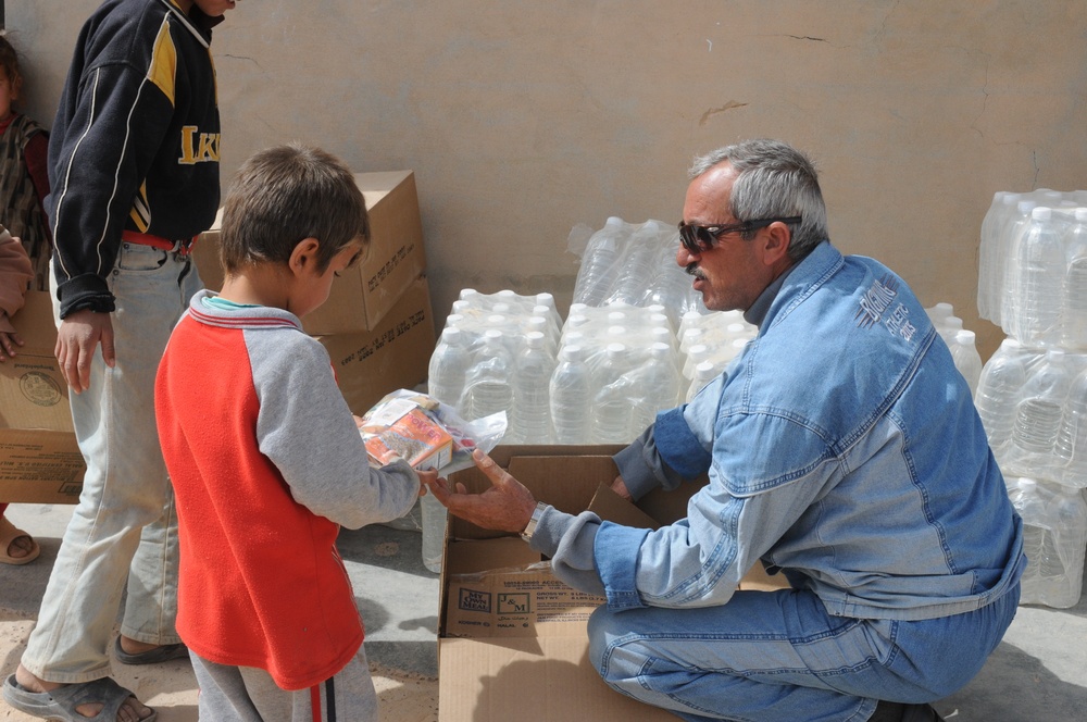 Soldiers Distribute Water and Food