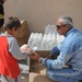 Soldiers Distribute Water and Food