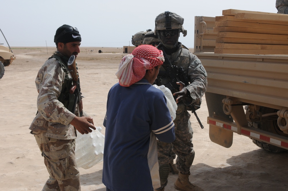 Soldiers Distribute Water and Food